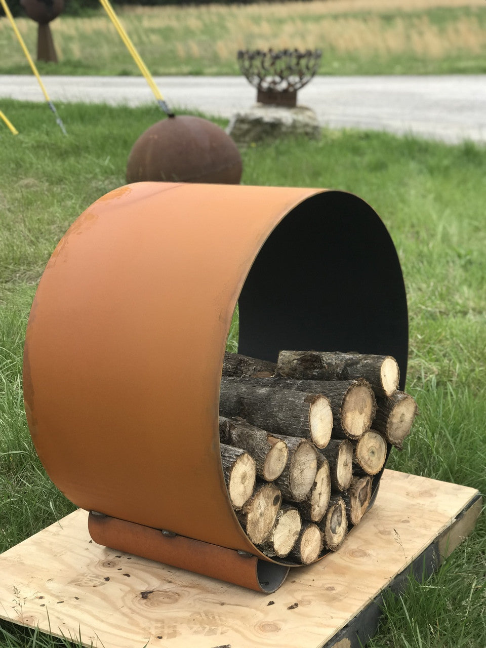 Orbital Log Rack - Fire Pit Art circular carbon steel firewood rack