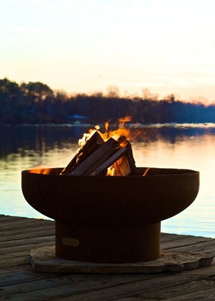 Low Boy Fire Pit by Fire Pit Art — lit at night | Outdoor Heat Direct